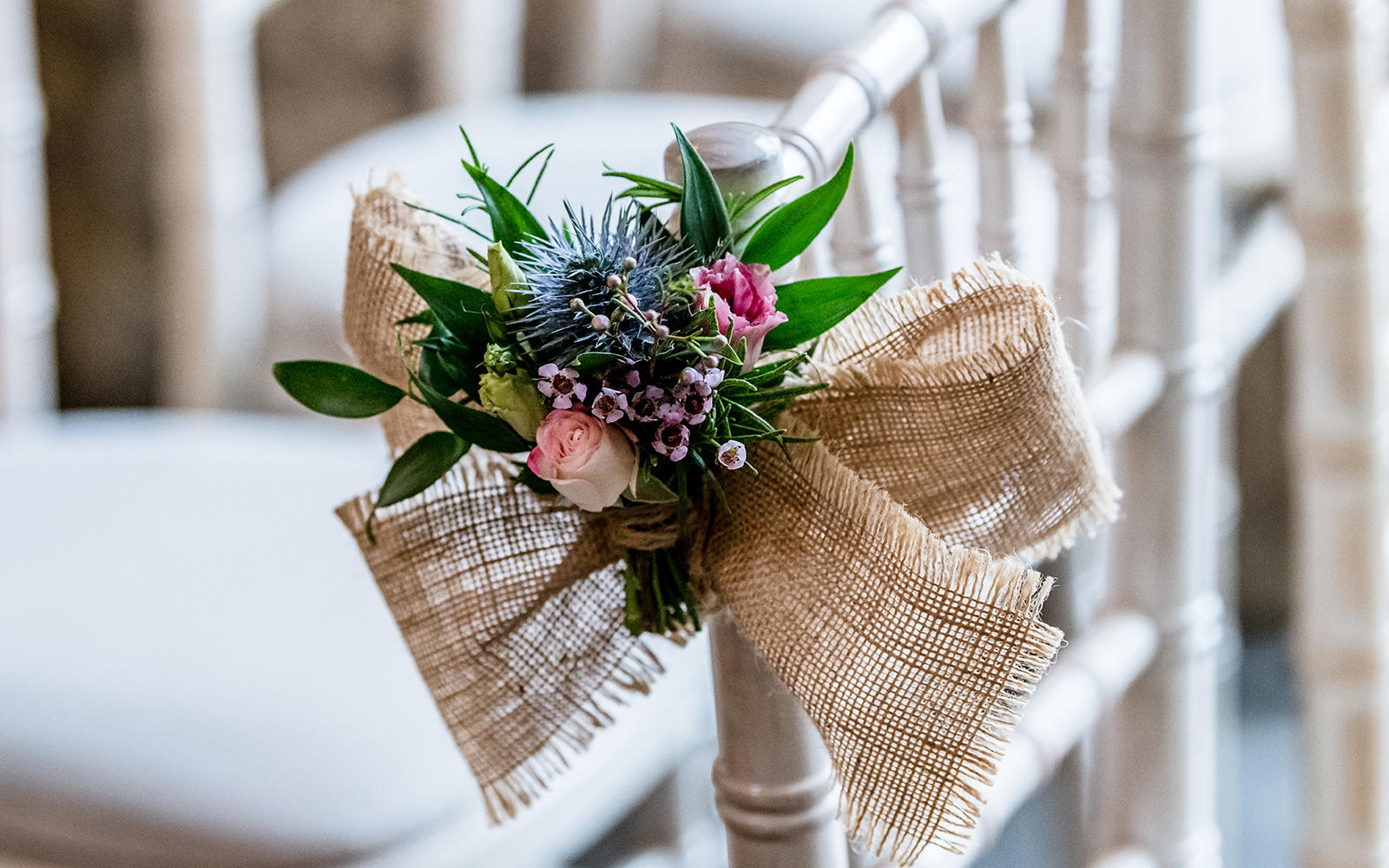 Capture Every Moment wedding photography duo from Cirencester reportage traditional photographers Lapstone Barn Chipping Campden Cotswolds venue chair floral decorations