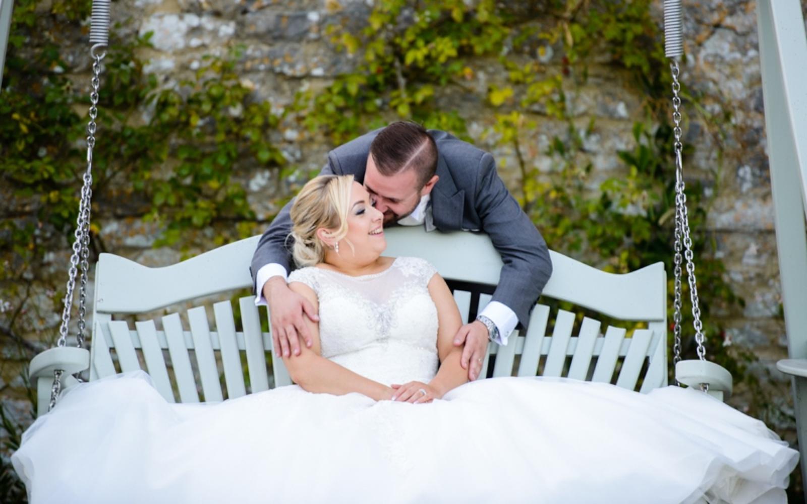 Steffen Milsom Photography Real Wedding Photographer Wiltshire Caswell House Oxfordshire swing bench cap sleeved dress