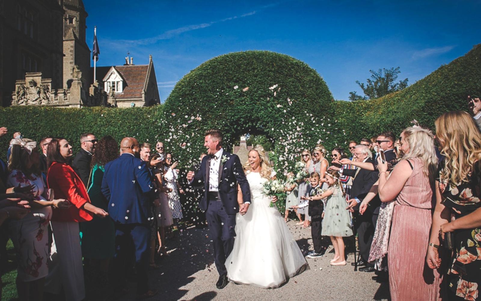 Libby Clark Photography Real Wedding photographer De Vere Tortworth Court Gloucestershire confetti just married 