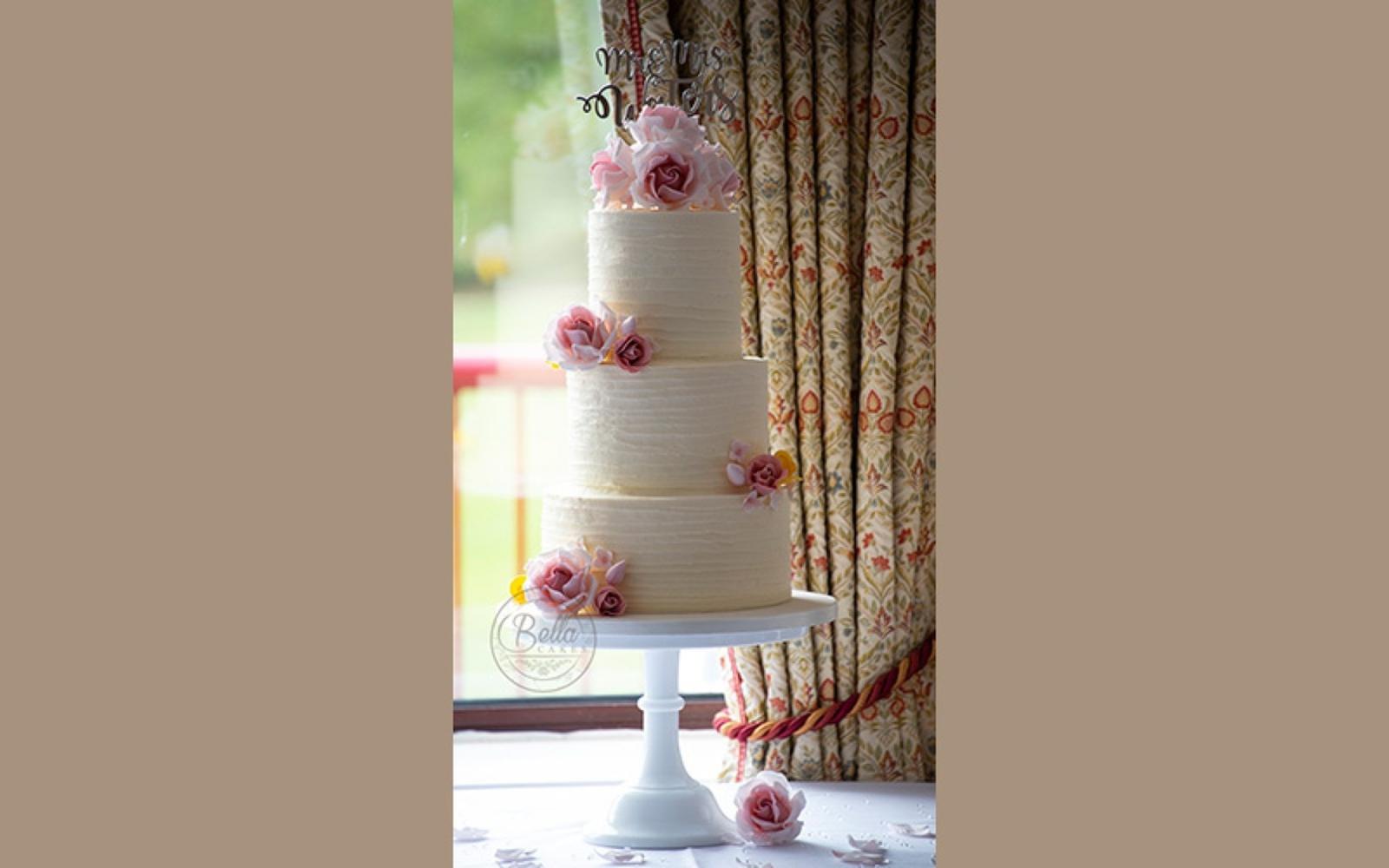 Real Wedding Whitewed Directory approved cake designer Bella Cakes Sharon Wrag Barn Highworth three tier pink rose buttercream