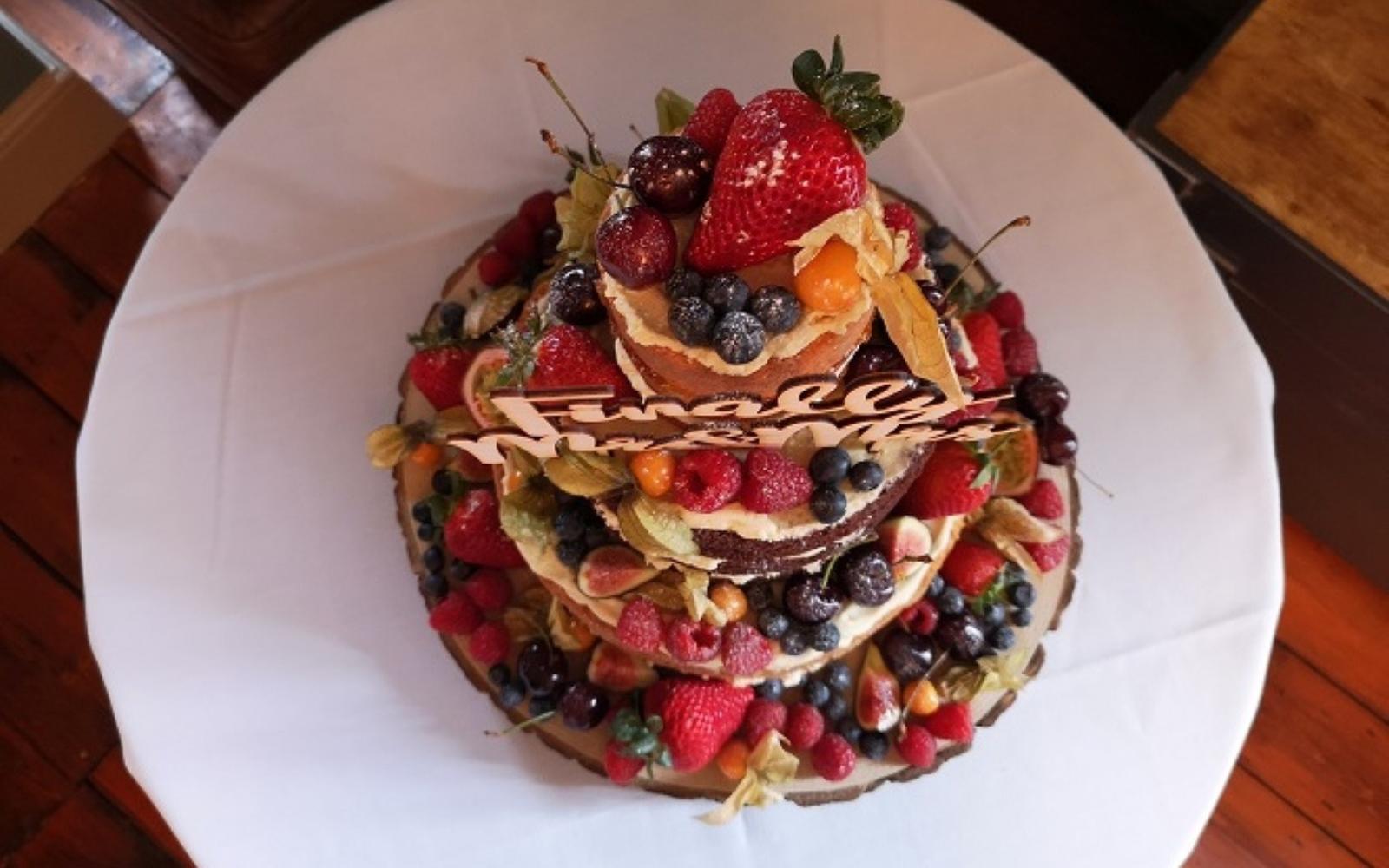 Three tier sponge and fruit display naked cake