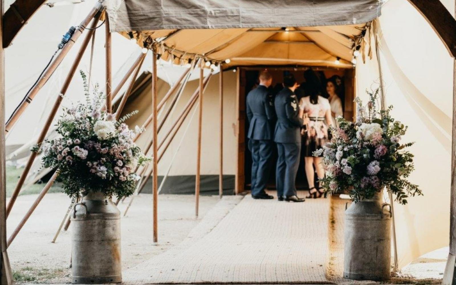 Corky and Prince Real Wedding florist and event stylist Gloucestershire Tipi venue Southrop Cotswolds reception entrance floral displays