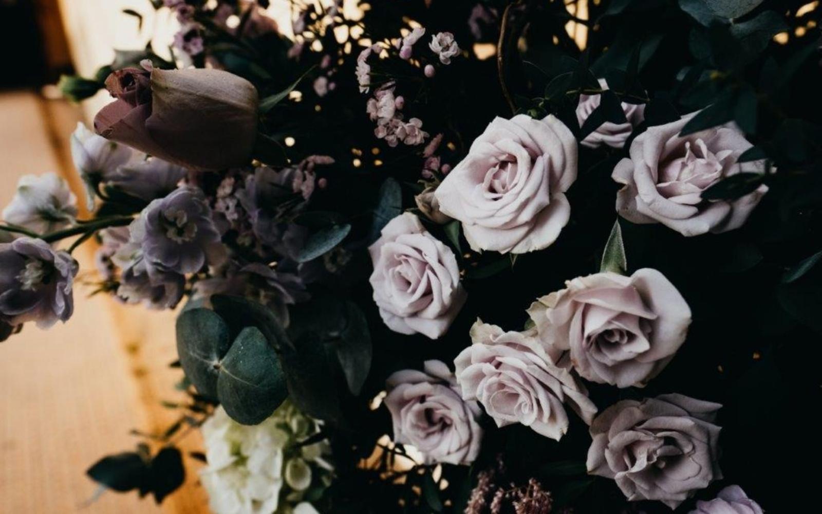 Corky and Prince Real Wedding florist and event stylist Gloucestershire Tipi venue Southrop Cotswolds mauve roses foliage