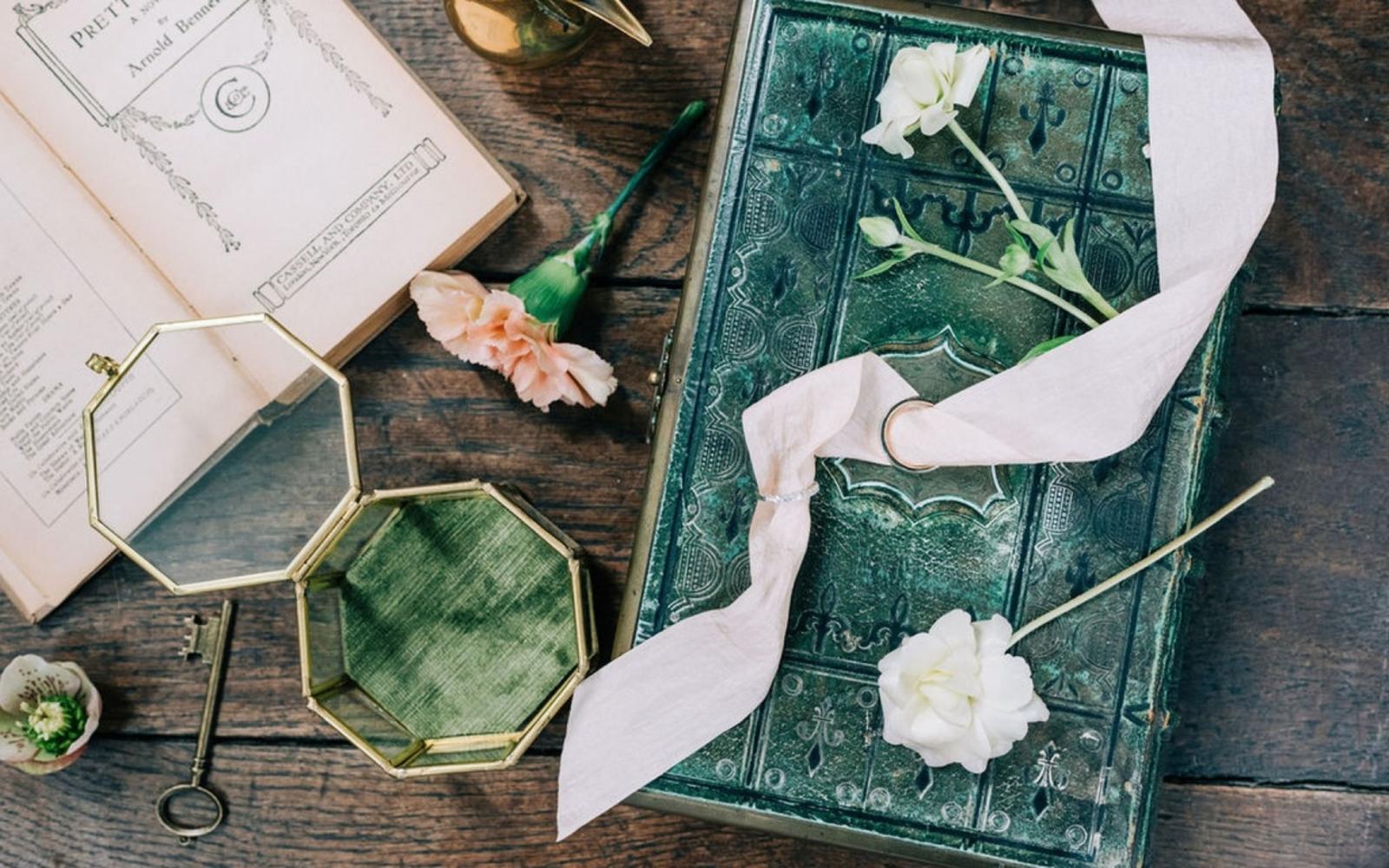 Corky and Prince Kimmi's Cakes Polly Morton Makeup Artist Dymond's Shoes and Accessories The Middle Green My eden Rachel Jane Photography styled shoot at The Royal Agricultural University wedding venue Cirencester eco-friendly artisan sustainable wedding rings 