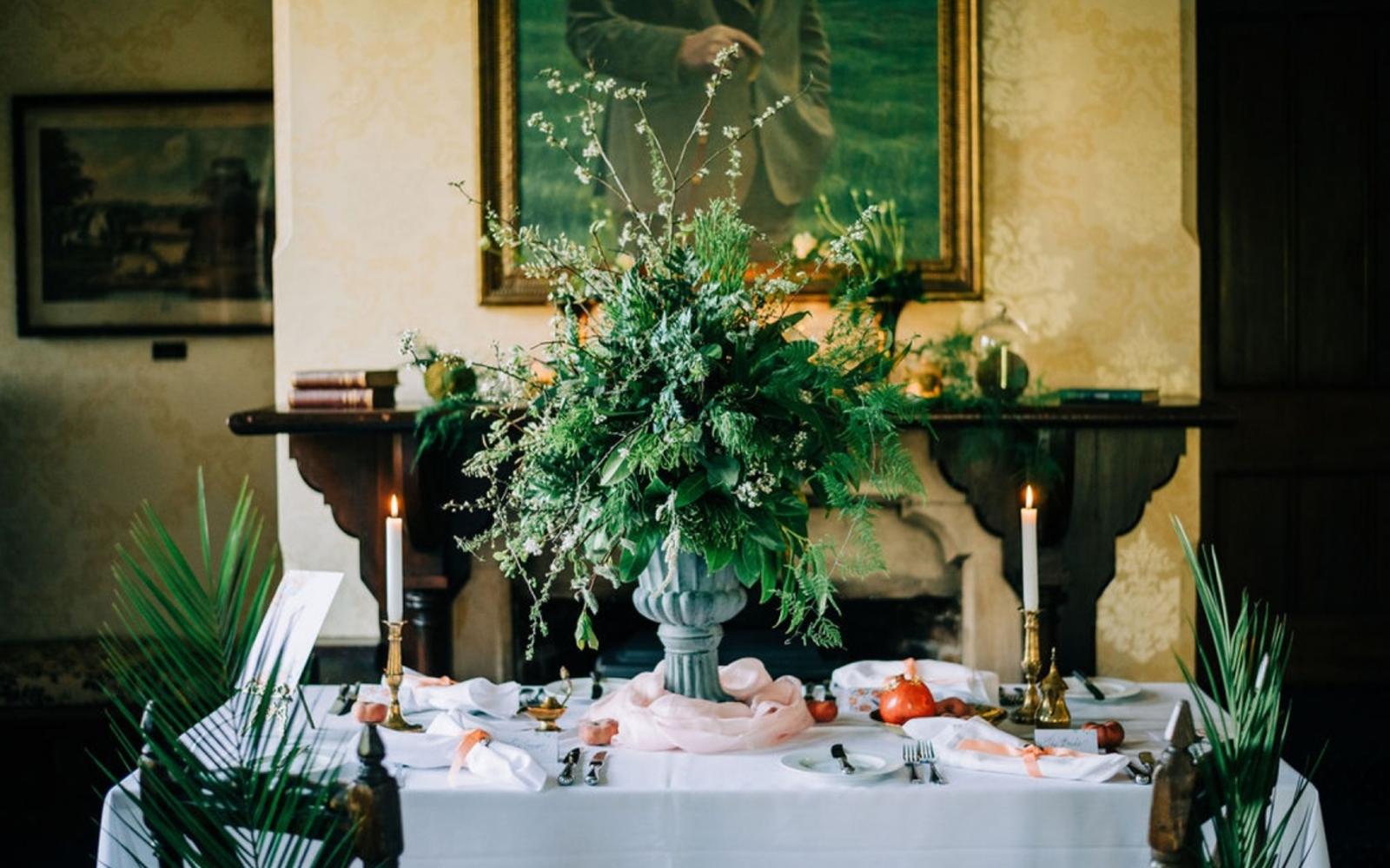 Corky and Prince Kimmi's Cakes Polly Morton Makeup Artist Dymond's Shoes and Accessories The Middle Green My eden Rachel Jane Photography styled shoot at The Royal Agricultural University wedding venue Cirencester eco-friendly artisan sustainable greenery top table display