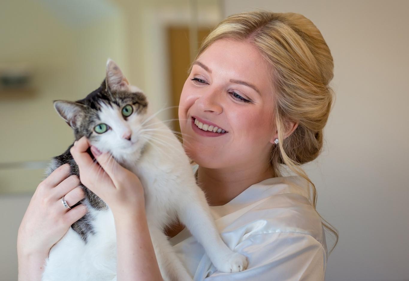 Luaren holding a cat