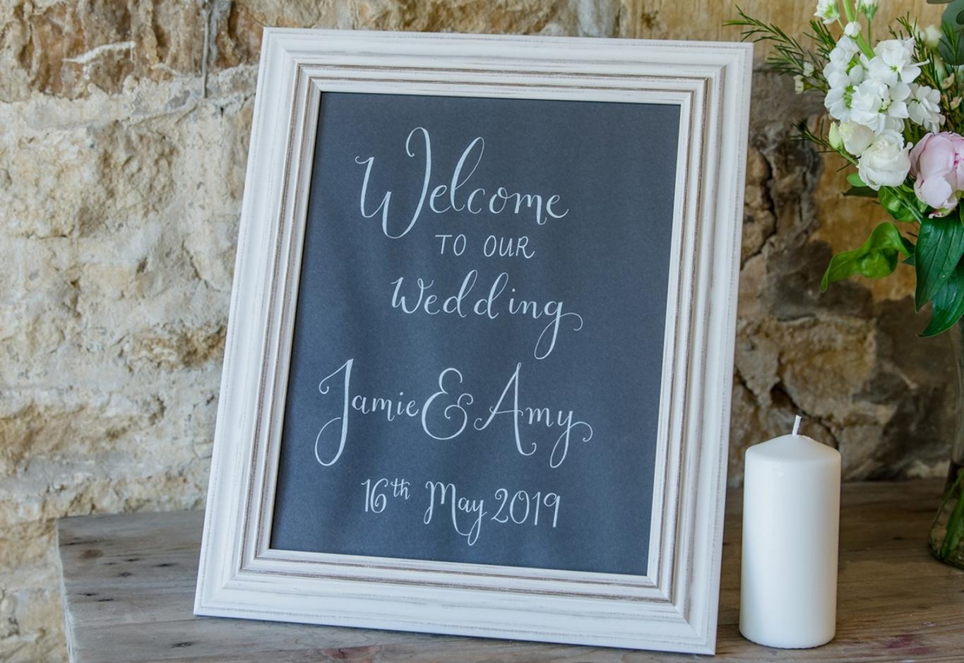 Capture Every Moment wedding photography duo from Cirencester reportage and traditional photographers Lapstone Barn Chipping Campden Cotswolds venue on the day stationery welcome sign 