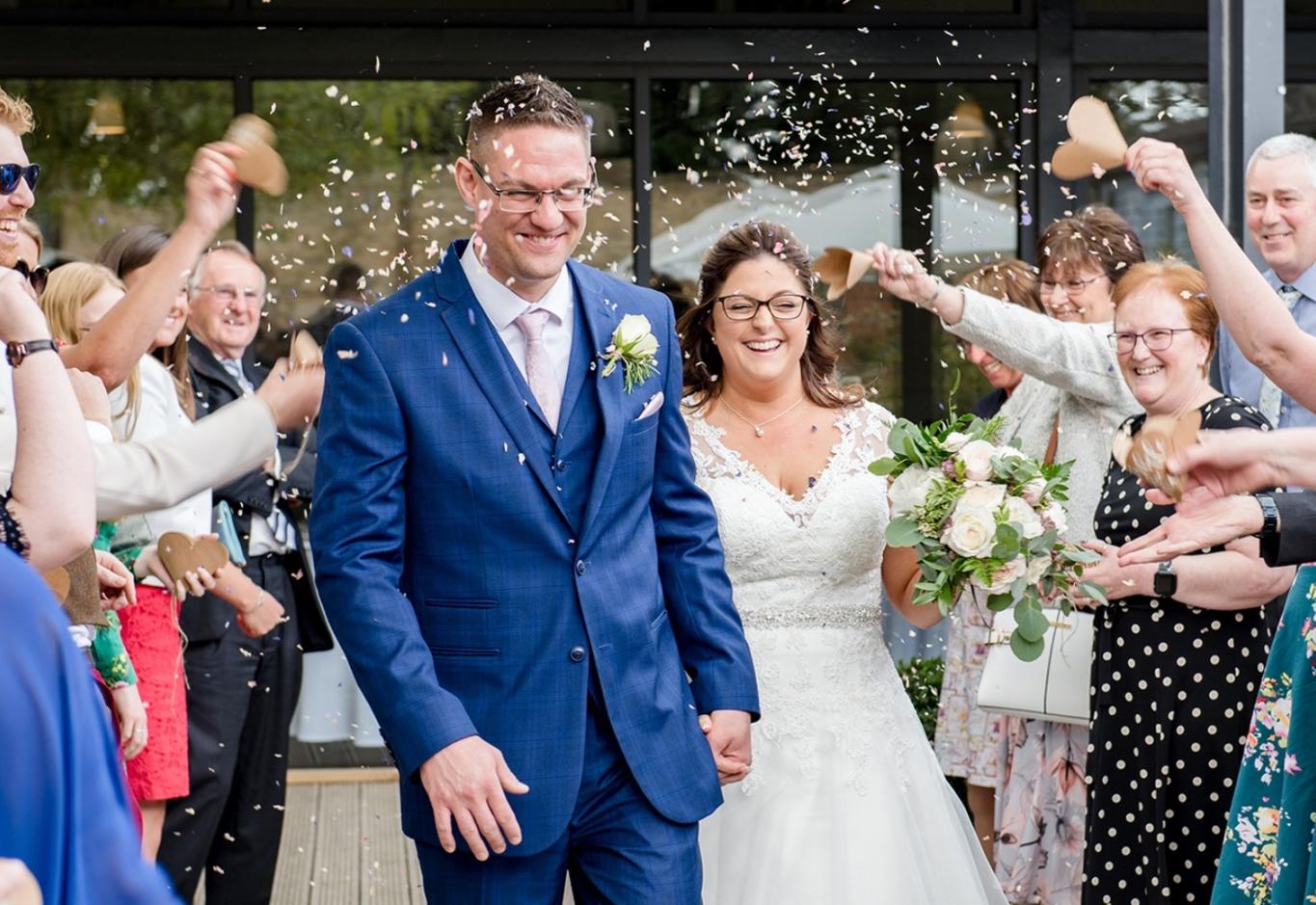Capture Every Moment wedding photography duo from Cirencester reportage and traditional photographers Lapstone Barn Chipping Campden Cotswolds venue confetti shot just married 