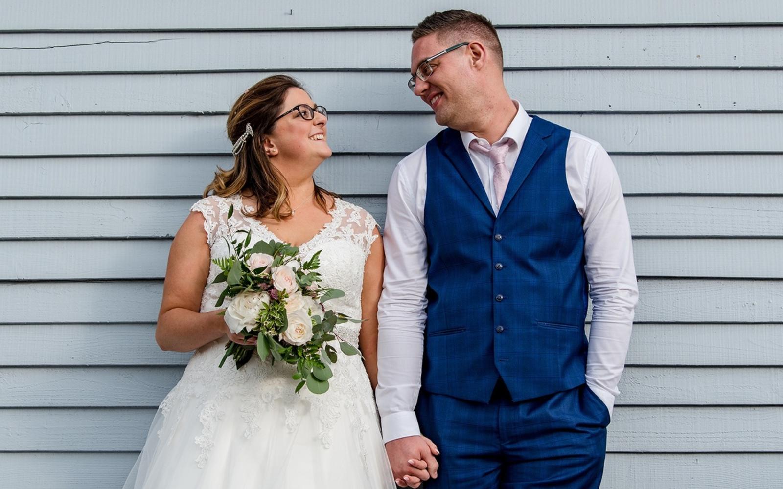 Capture Every Moment wedding photography duo from Cirencester reportage and traditional photographers Lapstone Barn Chipping Campden Cotswolds venue relaxed photo of bride and groom bridal bouquet