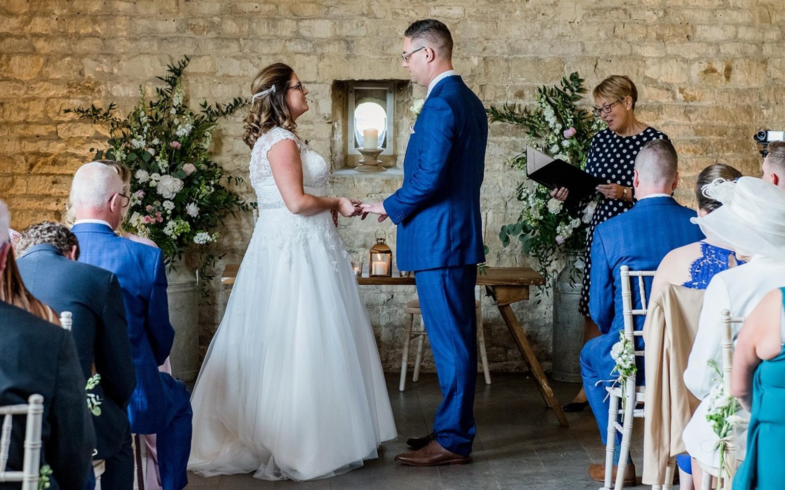 Capture Every Moment wedding photography duo from Cirencester reportage and traditional photographers Lapstone Barn Chipping Campden Cotswolds venue floral decorations in urns 