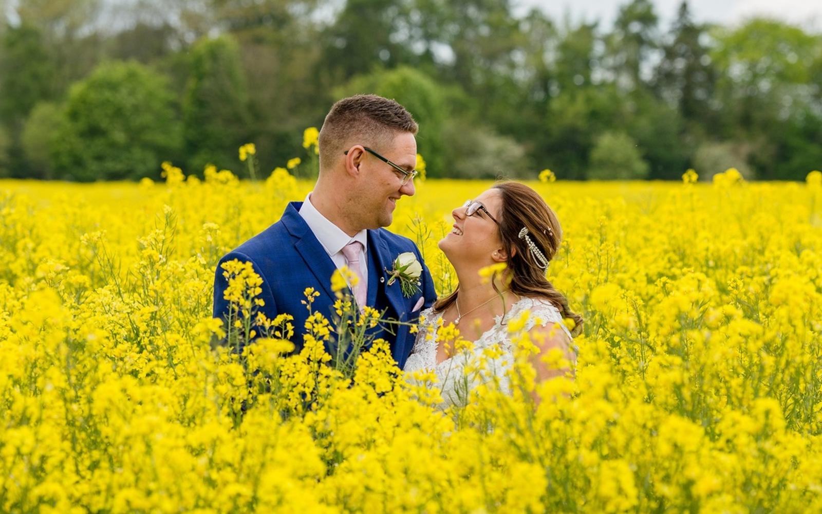 Capture Every Moment wedding photography duo from Cirencester reportage and traditional photographers Lapstone Barn Chipping Campden Cotswolds venue farmers field floral photo 
