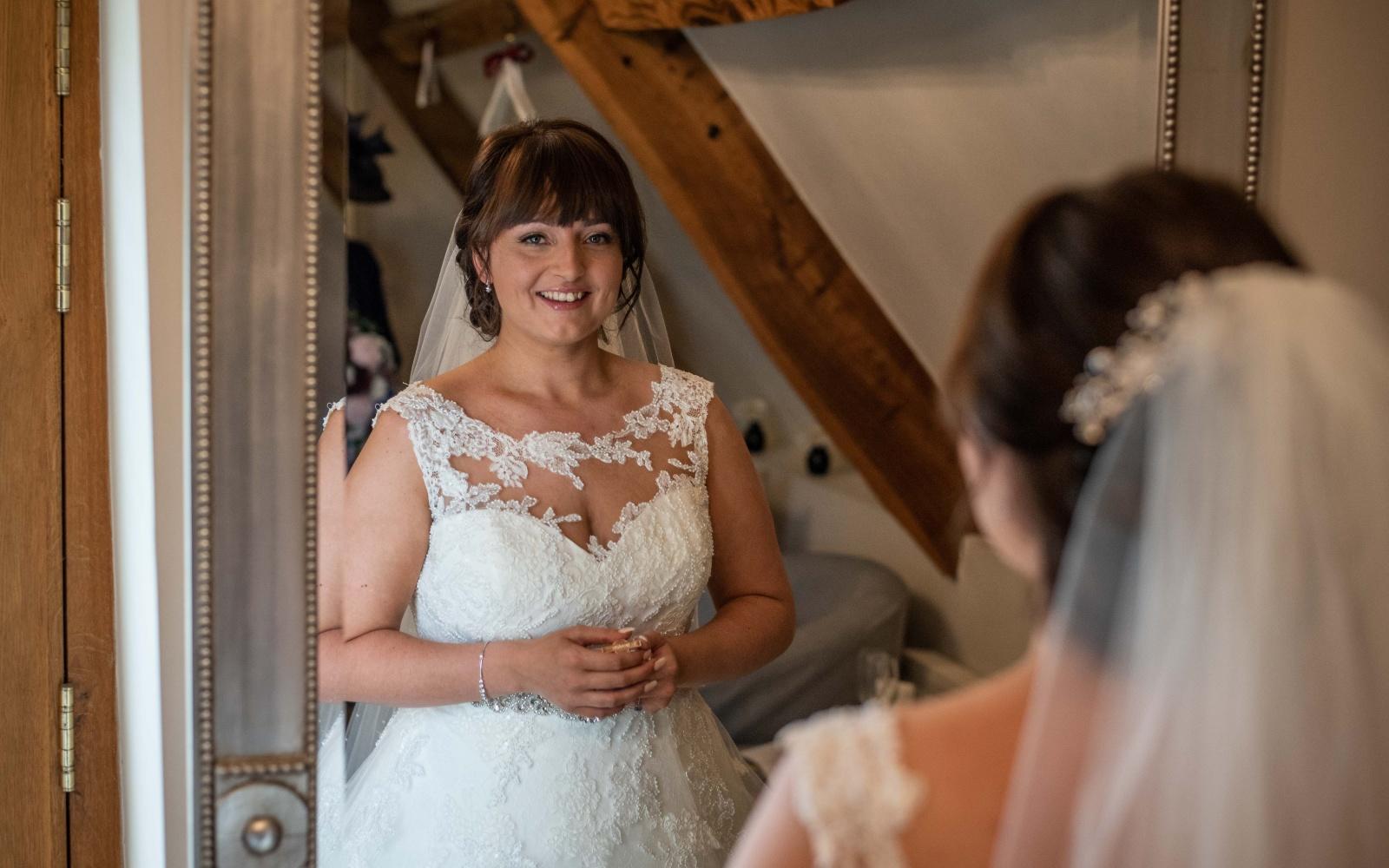 Real Wedding Strike A Pose Photography Wiltshire wedding photographer Kingscote Barn Tetbury Gloucestershire wedding dress veil 