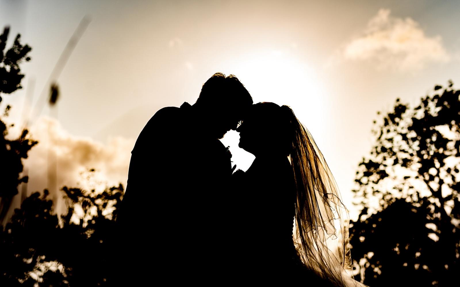 Capture Every Moment Real Wedding Photography Photographer duo Cirencester Hare and Hound Tetbury sunset photographer silhouette of Bride and Groom