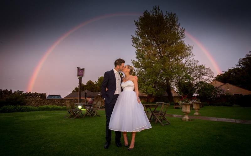 Old Lodge Whitewed Directory approved indoor outdoor wedding ceremony reception venue Cotswolds Minchinhampton Common Stroud Valley bride groom rainbow portrait