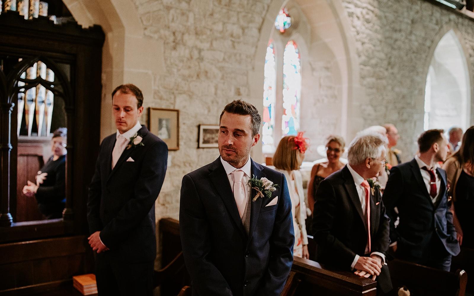 Real wedding Corky and Prince flowers florist stylist Gloucestershire Jenner's Barn Fairford Barn reception groom waiting for his bride buttonhole