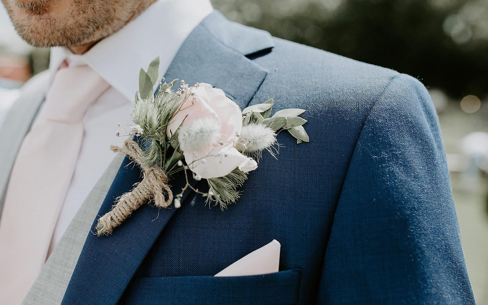 Real wedding Corky and Prince flowers florist stylist Gloucestershire Jenner's Barn Fairford Barn reception buttonhole