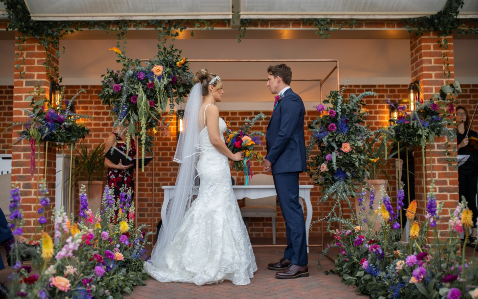 Real Wedding inspiration Hibiscus & Hodge Flowers Devizes florist contemporary colourful jewel Summer Syrencot Wiltshire aisle walkway indoor backdrop copper inspo