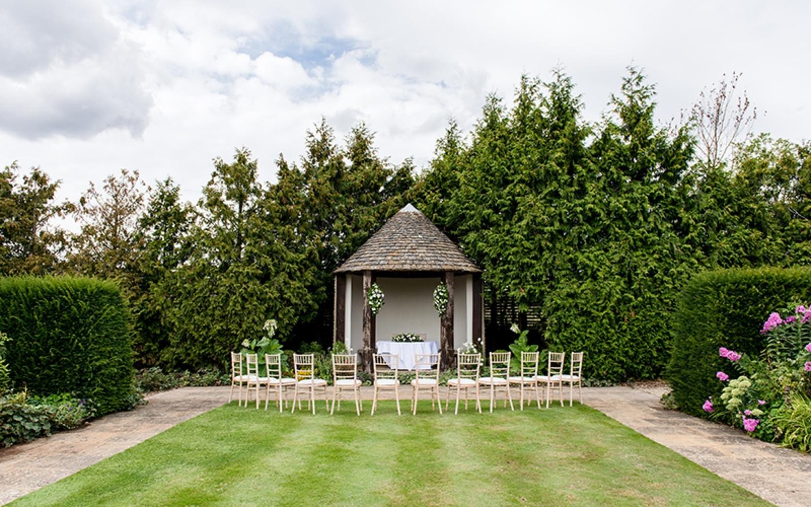 Real Wedding from Whitewed Directory approved wedding photographer duo of Cirencester Capture Every Moment outdoor ceremony at Whatley Manor