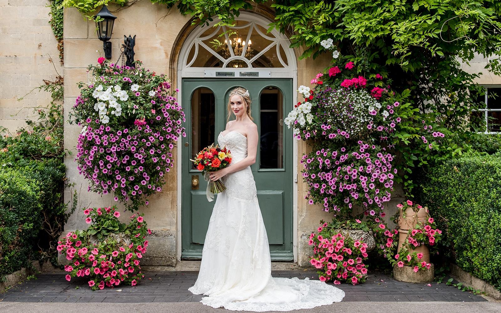 Make Up By Carissa makeup artist Cirencester Gloucestershire cruelty free make-up styled shoot Stratton House Cotswold entrance to wedding venue large floral displays