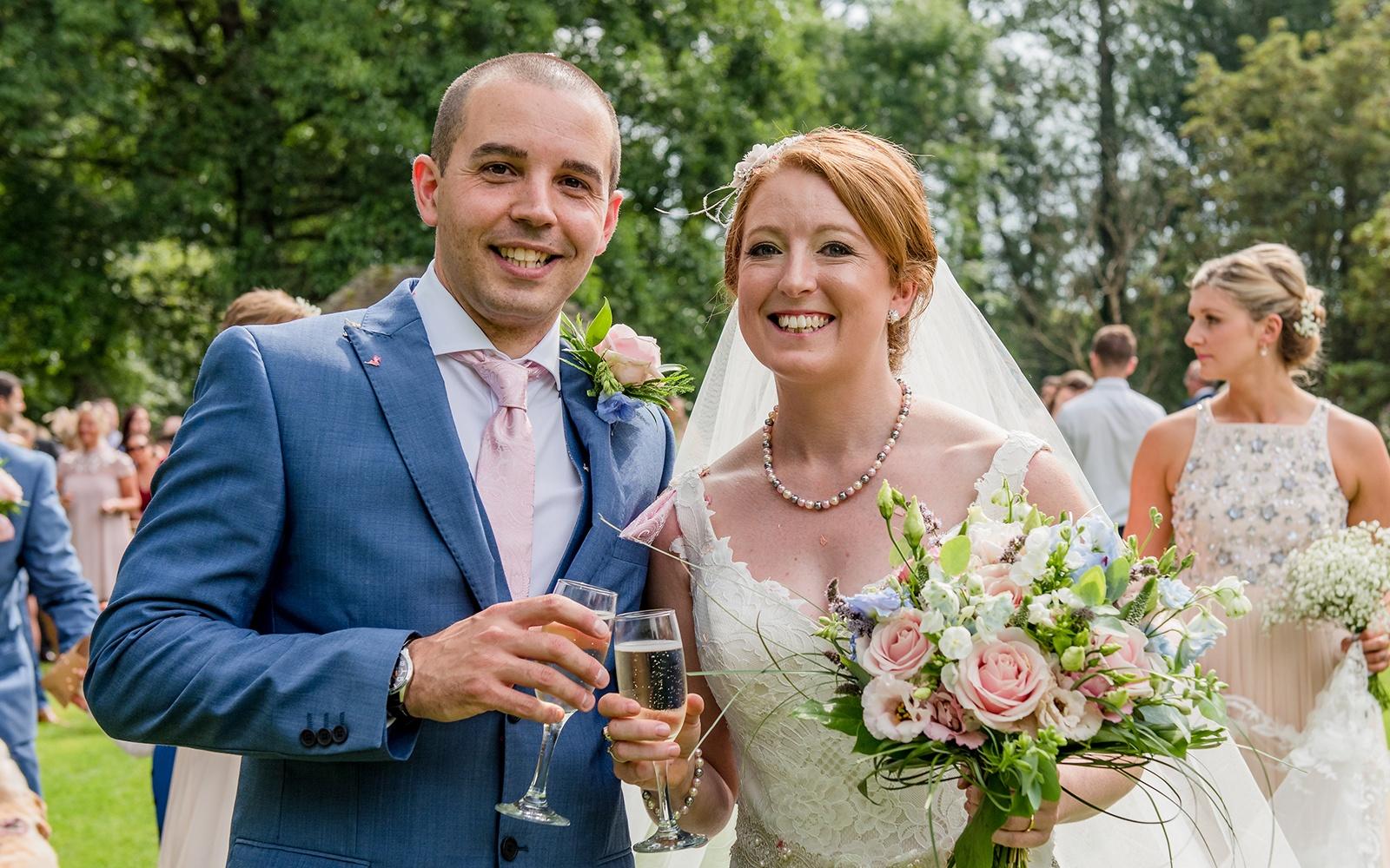 Capture Every Moment Cirencester based photography duo photographers Bittenham Springs wedding venue beautiful bridal bouquet pink roses 