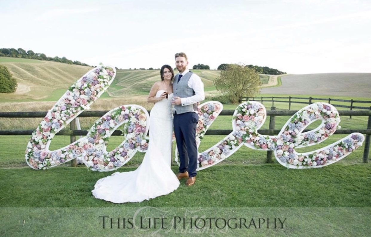 Whitewed Directory supplier of the month Burnt Orange Love Letter hire Bath Somerset 20ft scroll floral letters Wiltshire outdoor wedding venue