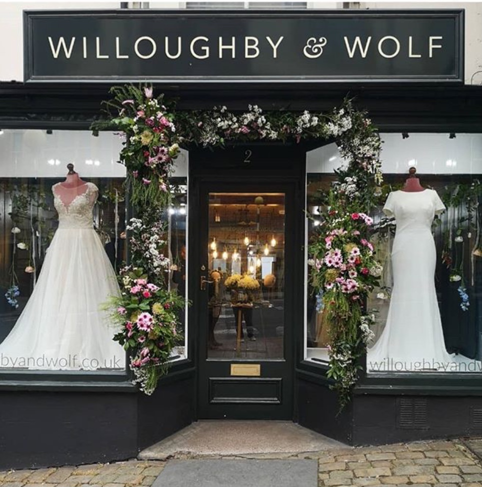 Whitewed Directory supplier of the month blog Willoughby and Wolf Bridal Boutique Marlborough Wiltshire shop frontage floral arch