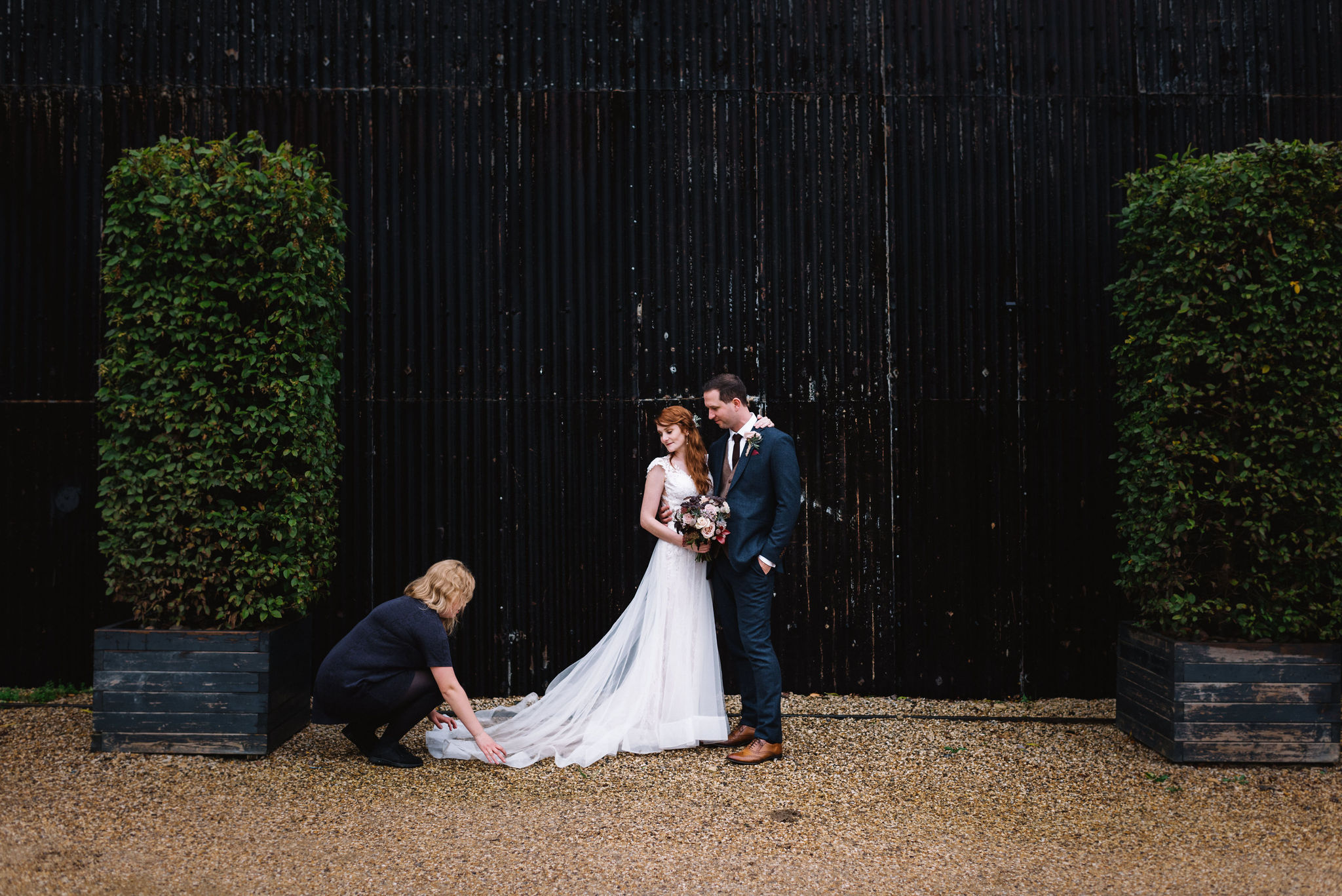 February supplier of the month Whitewed directory blog Tilly Clayden Weddings Wedding planner Gloucestershire Cotswold planning bride to be wedding day laying out the bridal dress couple photos